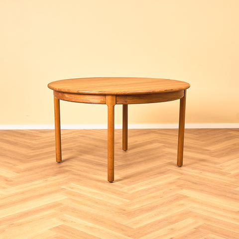 Danish round dining table in solid teak