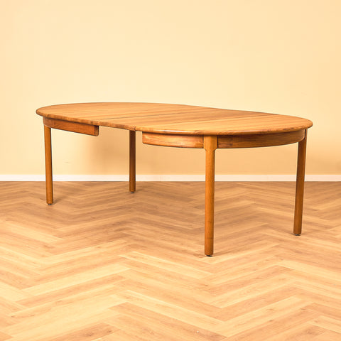 Danish round dining table in solid teak