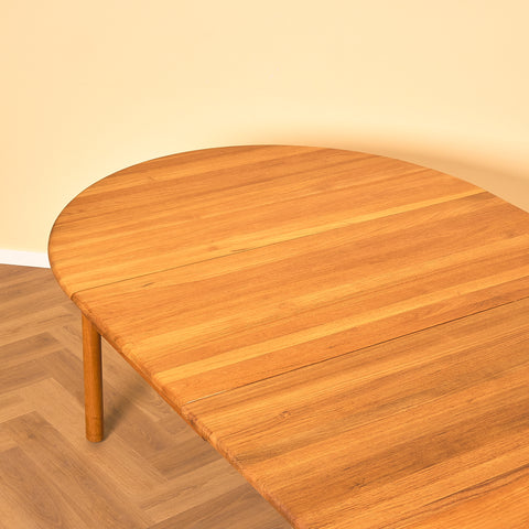 Danish round dining table in solid teak