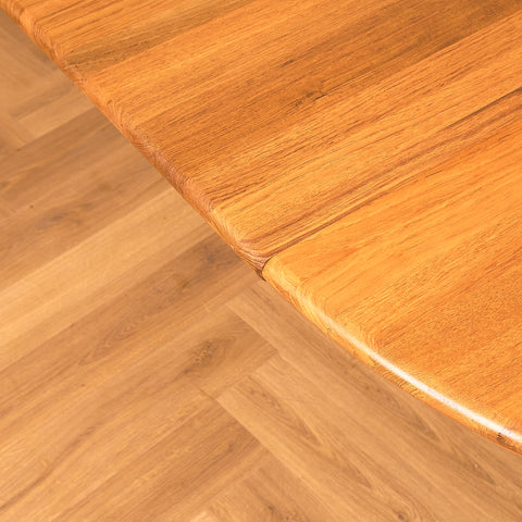 Danish round dining table in solid teak