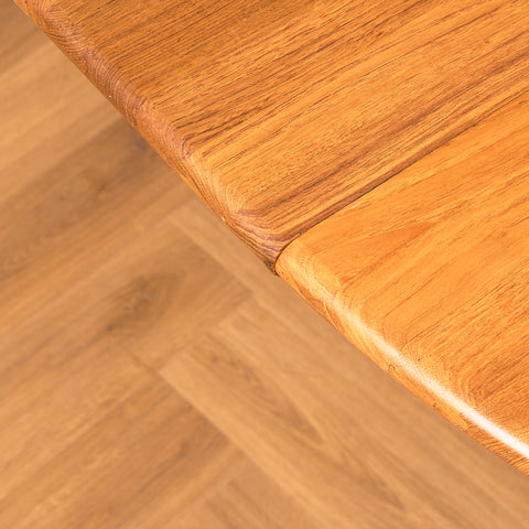 Danish round dining table in solid teak