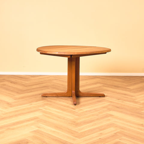 Danish round dining table in solid teak