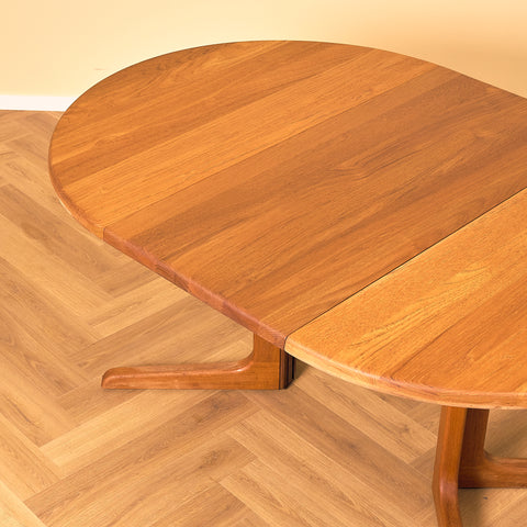 Danish round dining table in solid teak