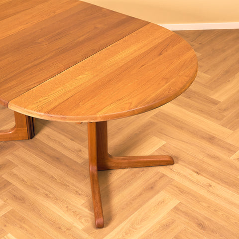 Danish round dining table in solid teak