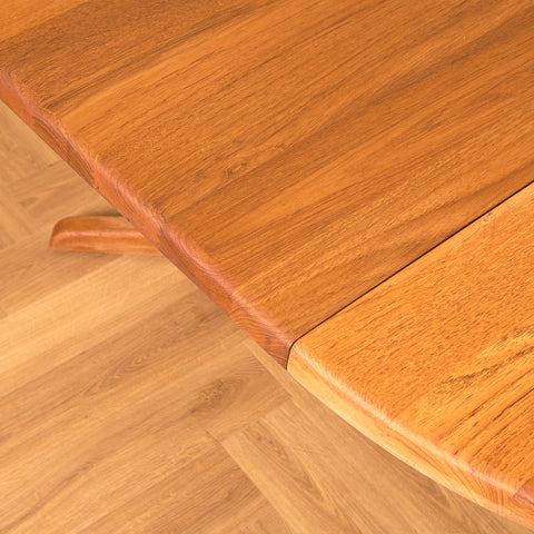 Danish round dining table in solid teak