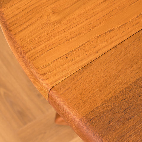 Danish round dining table in solid teak