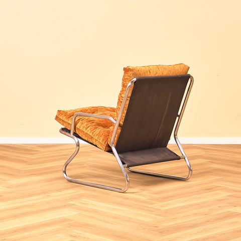 Mid-century armchair in chrome by Peter Hoyte