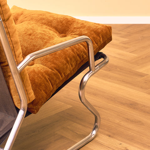 Mid-century armchair in chrome by Peter Hoyte