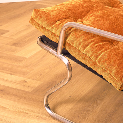 Mid-century armchair in chrome by Peter Hoyte