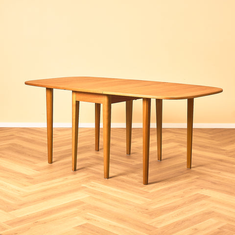 Swedish (Klaffbord) dining table in teak and beech