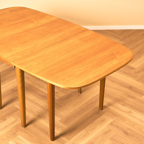Swedish (Klaffbord) dining table in teak and beech