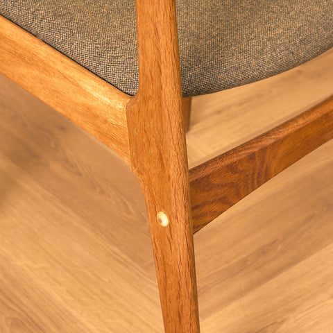 Danish dining chairs in oak by Johannes Andersen for Uldum Mobelfabrik