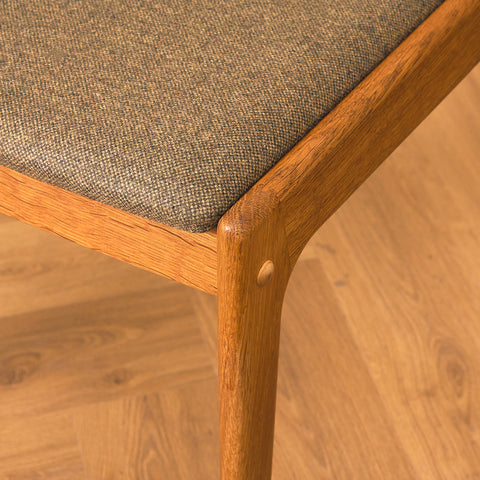 Danish dining chairs in oak by Johannes Andersen for Uldum Mobelfabrik