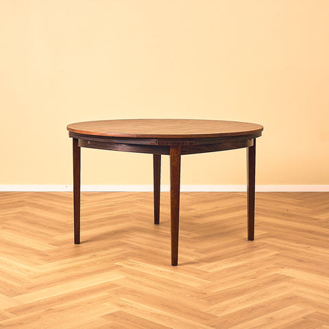 Danish round dining table in Santos rosewood, model 'Flip-Flap' by Dyrlund