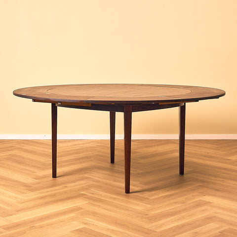 Danish round dining table in Santos rosewood, model 'Flip-Flap' by Dyrlund