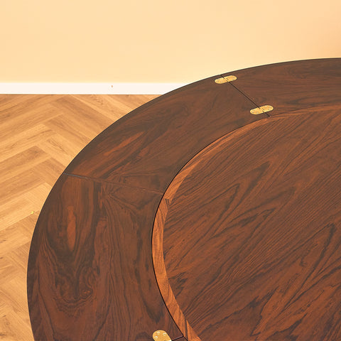 Danish round dining table in Santos rosewood, model 'Flip-Flap' by Dyrlund