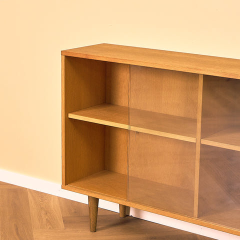 Low Oak Bookshelf with Sliding Glass Doors