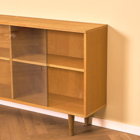 Low Oak Bookshelf with Sliding Glass Doors