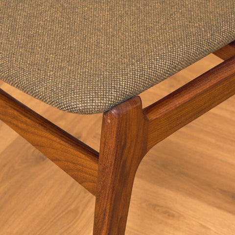 Danish dining chairs in teak and walnut by Findahl