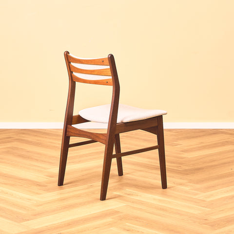 Danish dining chairs in teak and walnut by Findahl