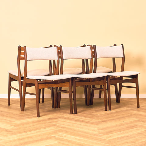 Danish dining chairs in teak and walnut by Findahl