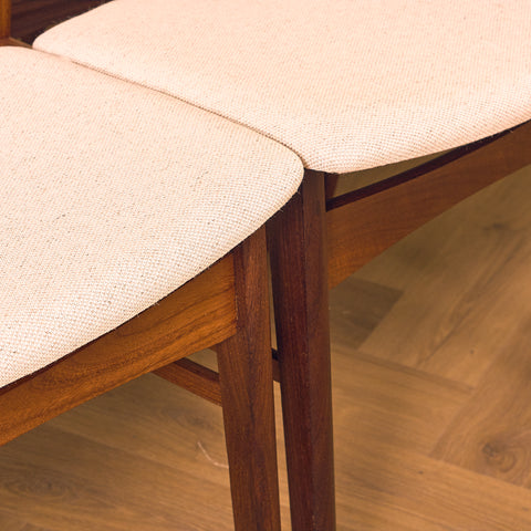 Danish dining chairs in teak and walnut by Findahl