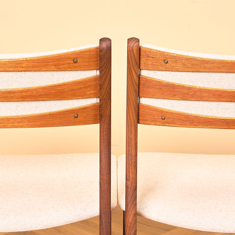 Danish dining chairs in teak and walnut by Findahl