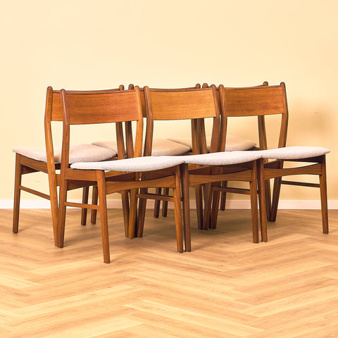Danish dining chairs in teak and walnut