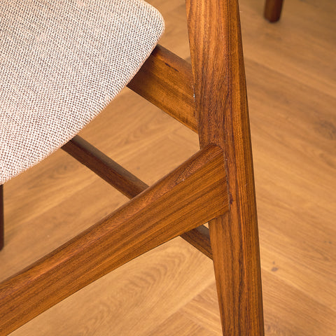Danish dining chairs in teak and walnut
