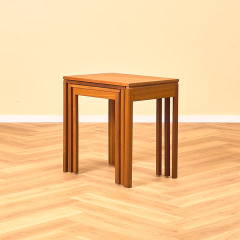 Mid-century set of nest of tables in teak by McIntosh