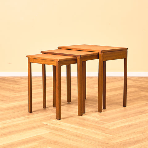 Mid-century set of nest of tables in teak by McIntosh