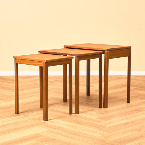 Mid-century set of nest of tables in teak by McIntosh