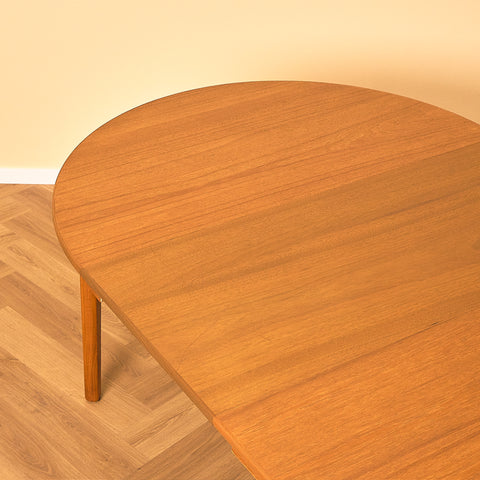 Danish round dining table in teak