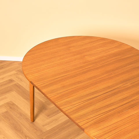 Swedish round dining table in teak and beech