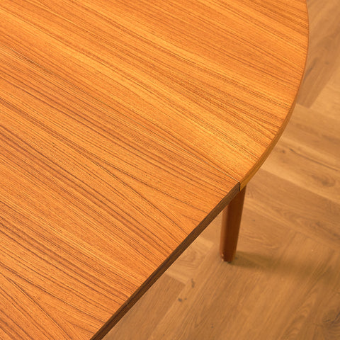 Swedish round dining table in teak and beech