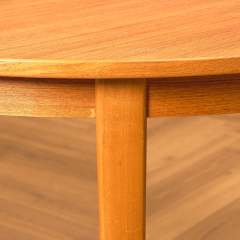 Swedish round dining table in teak and beech