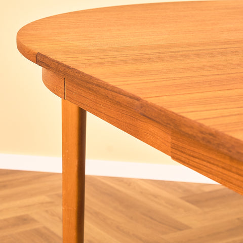 Swedish round dining table in teak and beech