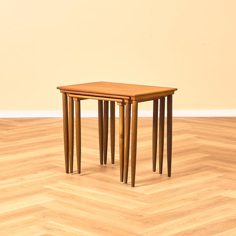 Danish nest of tables in teak and walnut