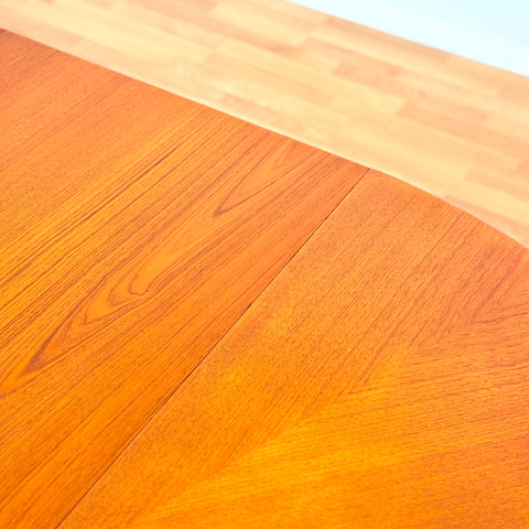 Swedish round dining table in teak by David Rosén for NK