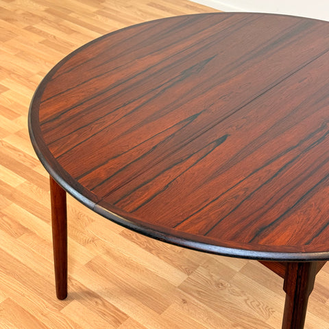 Danish round dining table in Santos rosewood by CJ Rosengarden