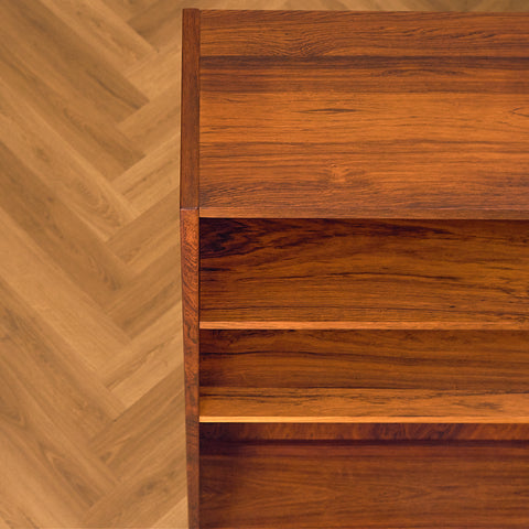 IKEA Excellent Santos Rosewood Bookshelf with Drawer and Brass Handles, close-up of the upper shelves