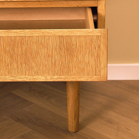 Danish Oak Sideboard with Four Drawers, close-up of the lower drawer and leg in oak