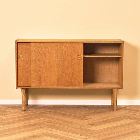 Danish Oak Sideboard with Sliding Doors, front view with the right door slid open