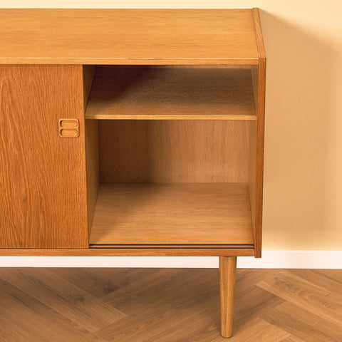 Danish Oak Sideboard with Sliding Doors, close-up of the interior shelf in oak