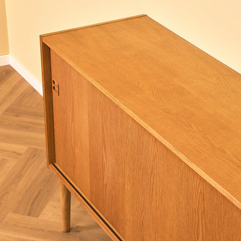 Danish Oak Sideboard with Sliding Doors, three-quarter view