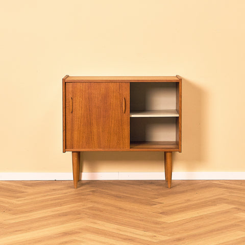 Swedish Teak Cabinet with Sliding Doors, front view with the right door slid open