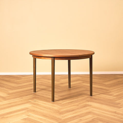 Round Walnut Extendable Dining Table