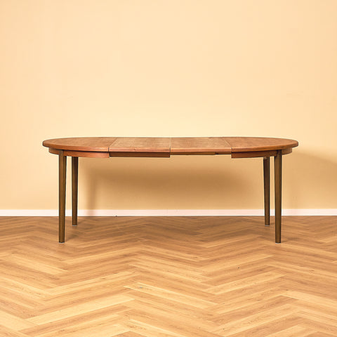 Round Walnut Extendable Dining Table
