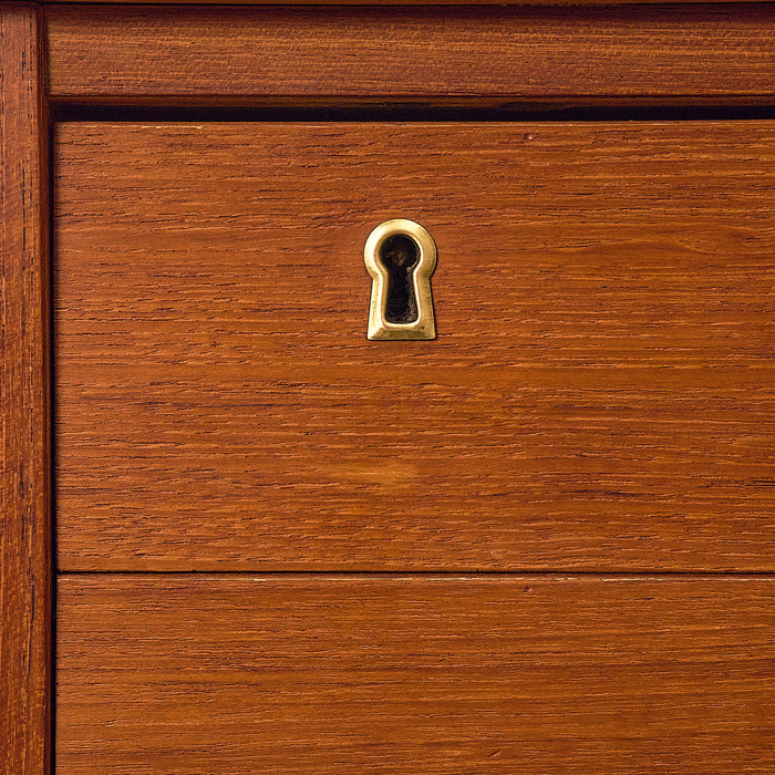 Dark Teak Writing Desk with Six Drawers, light scratches around the lock