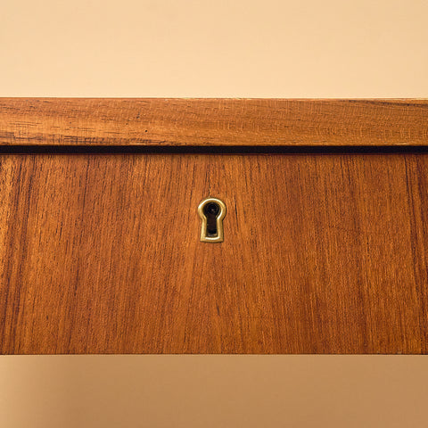 Teak Writing Desk with Tapered Legs, close-up of the lockable centre drawer